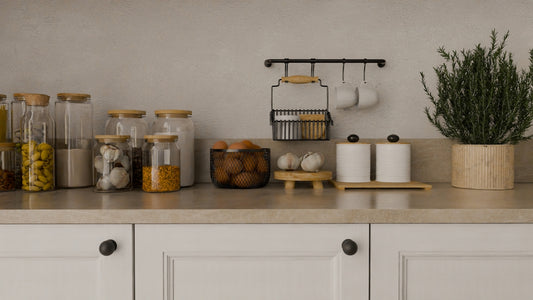 A kitchen counter topped with lots of jars and containers